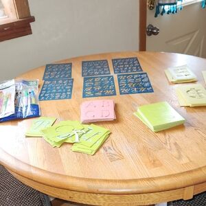 Various Stensils And Paint Brushes